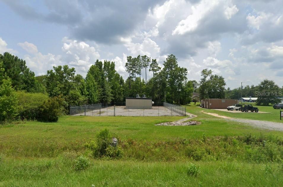 a view of a golf course with a fountain