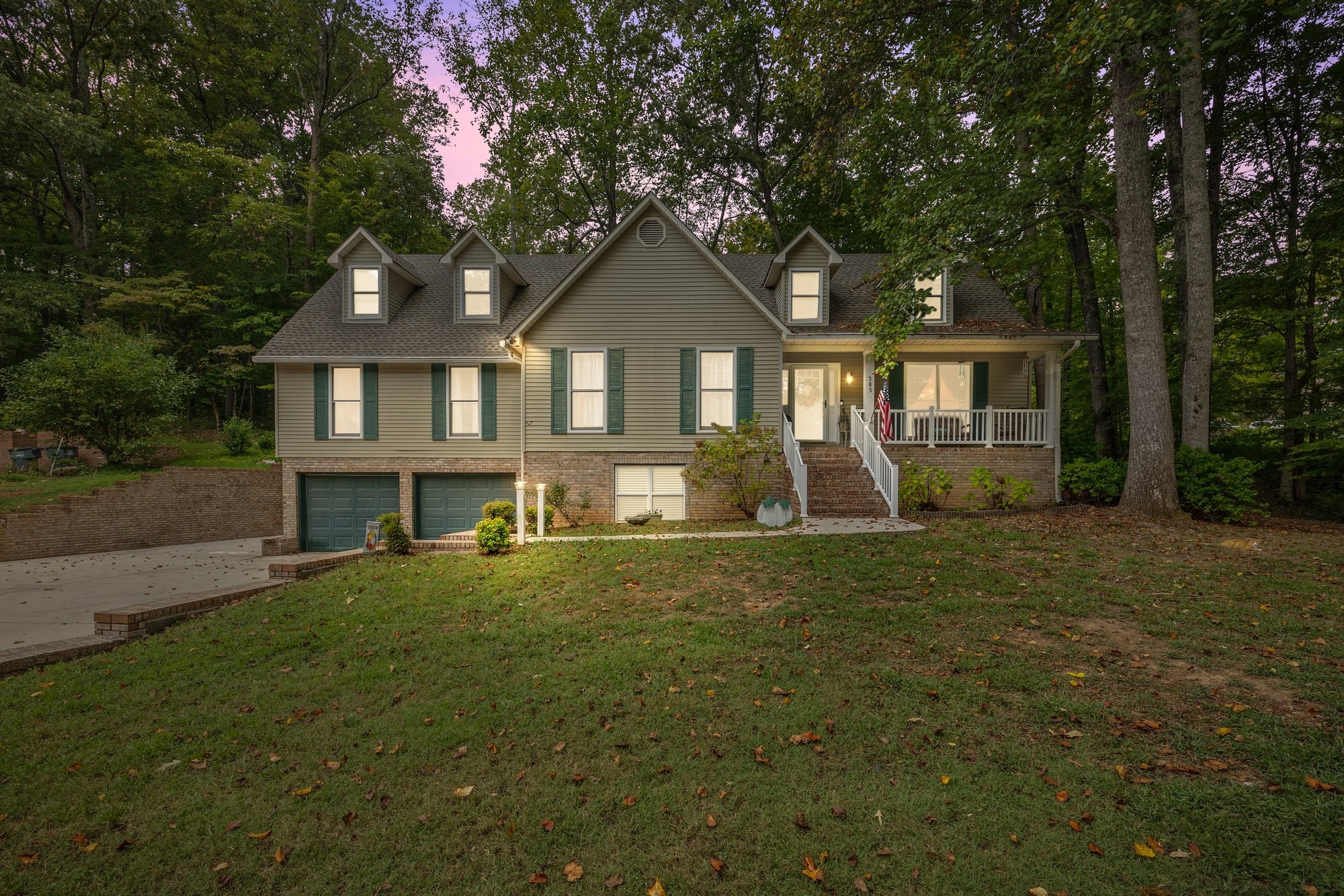 front view of a house with a yard