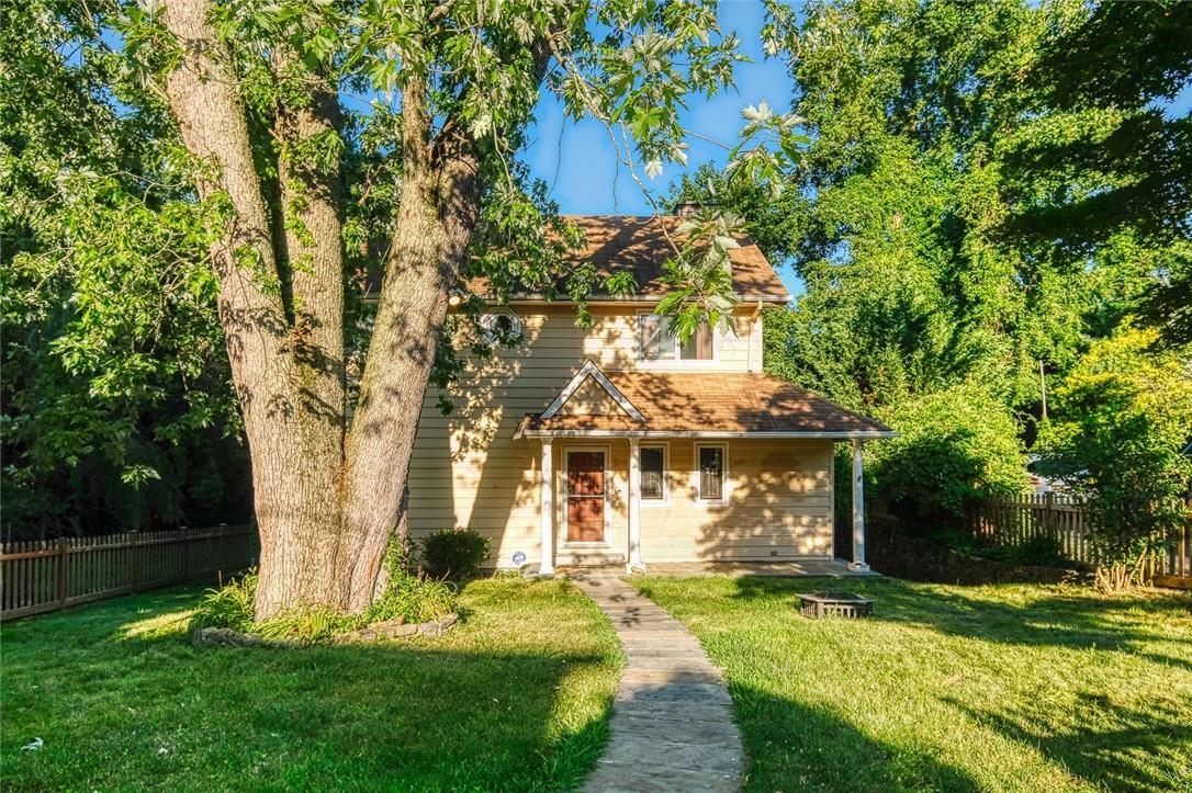 Front yard with magnificent silver maple