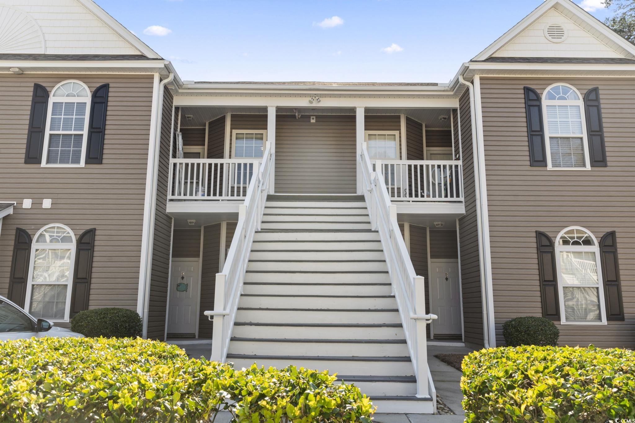 View of front of house with covered porch