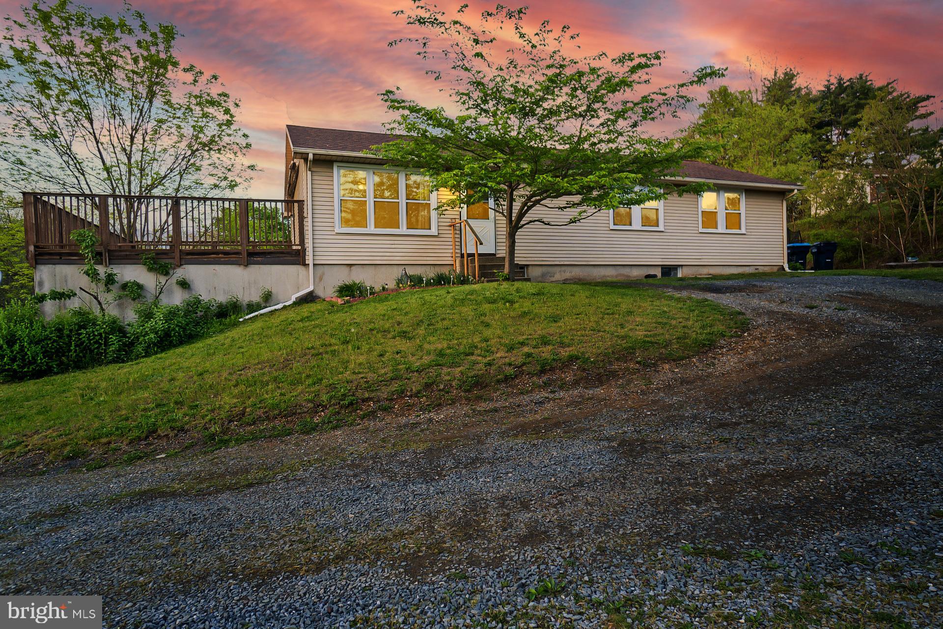 a view of backyard with green space