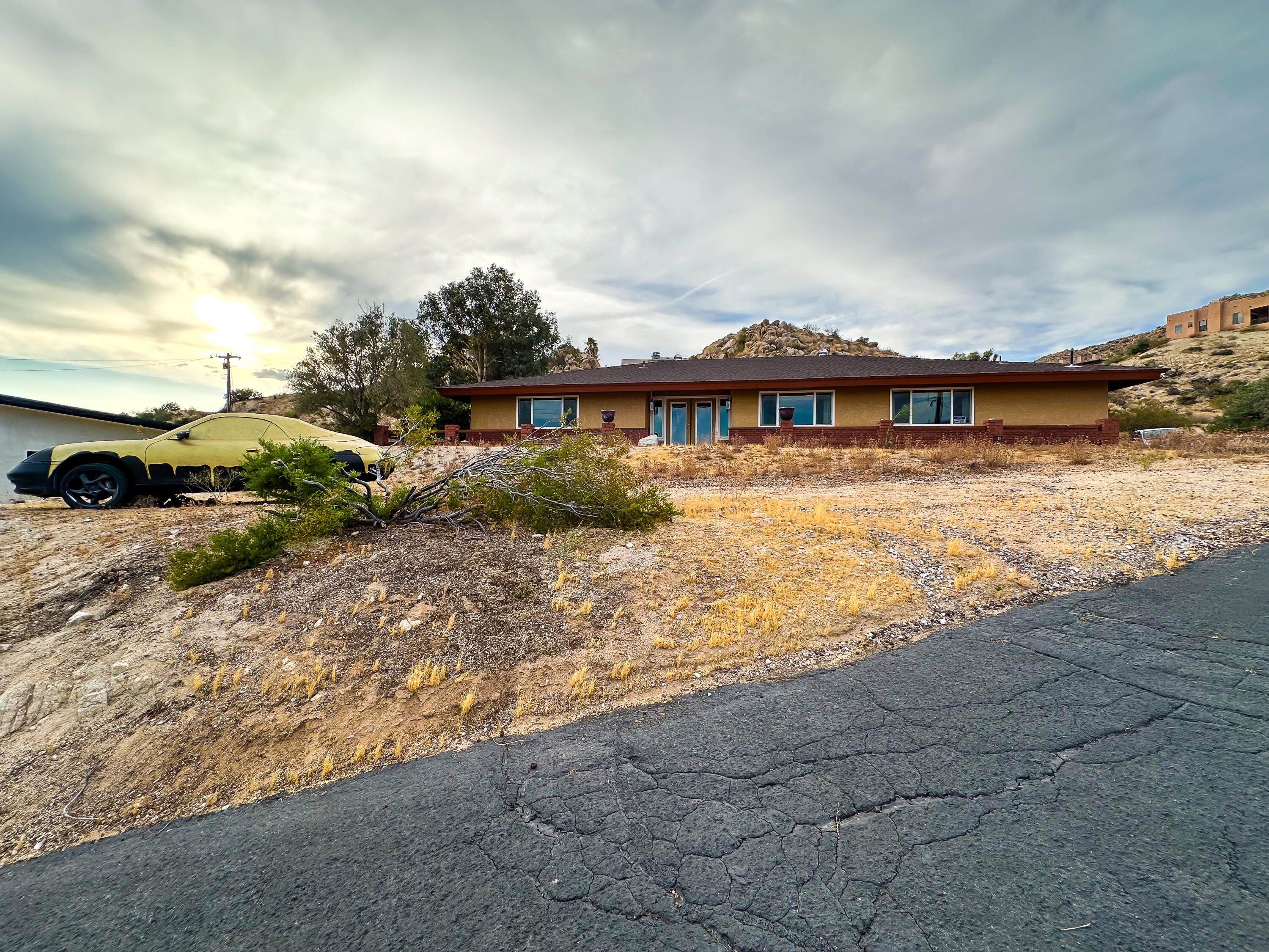 a view of house with outdoor space