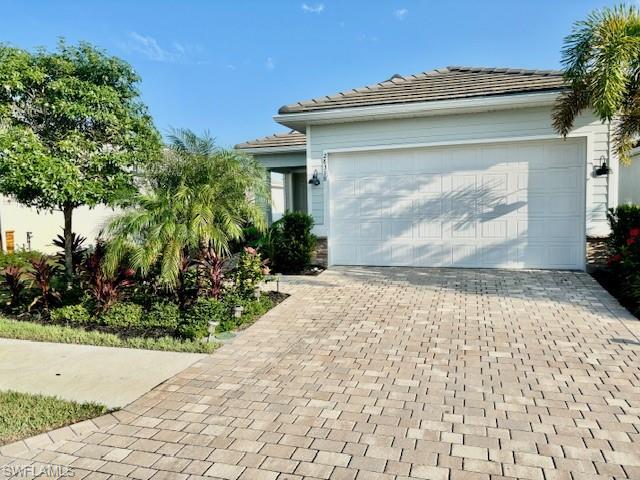 View of front of property with a garage