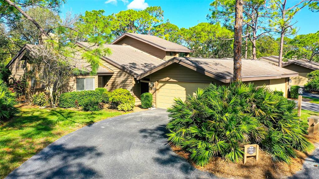 a house with trees in front of it