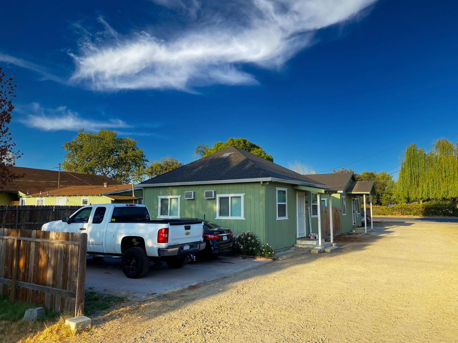 a car parked in front of a house