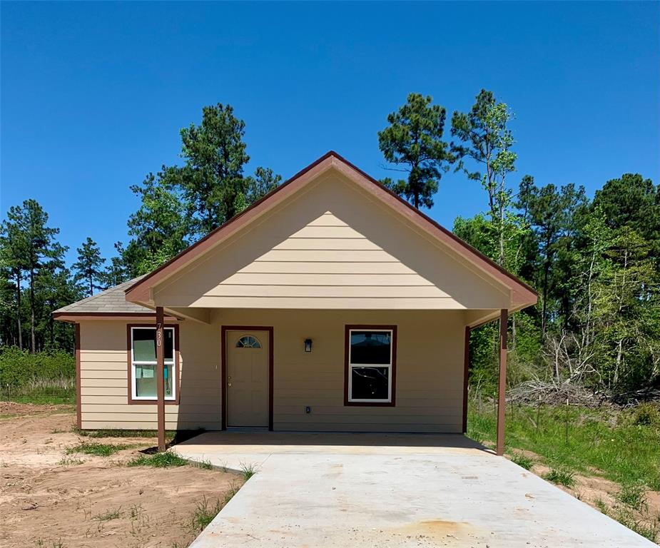 a front view of a house with a garage