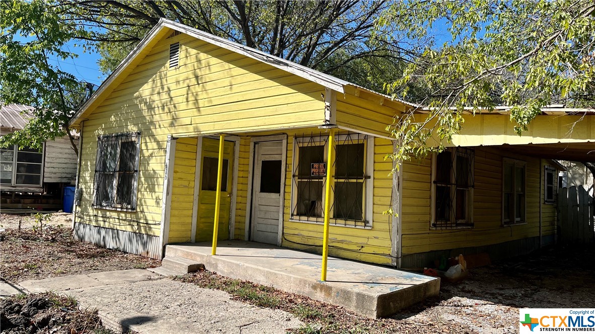 a view of a house with a porch