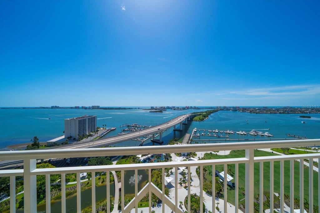 a view of a balcony with an ocean view