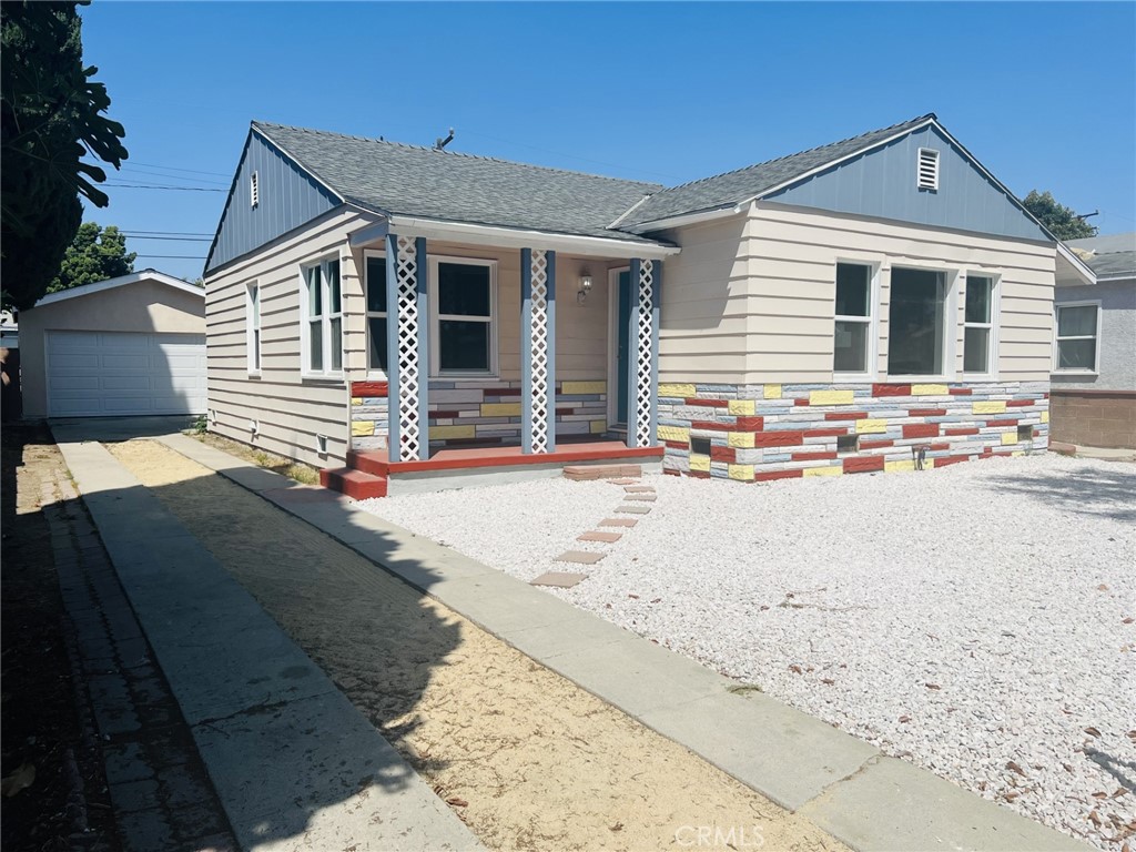 a front view of a house with a patio