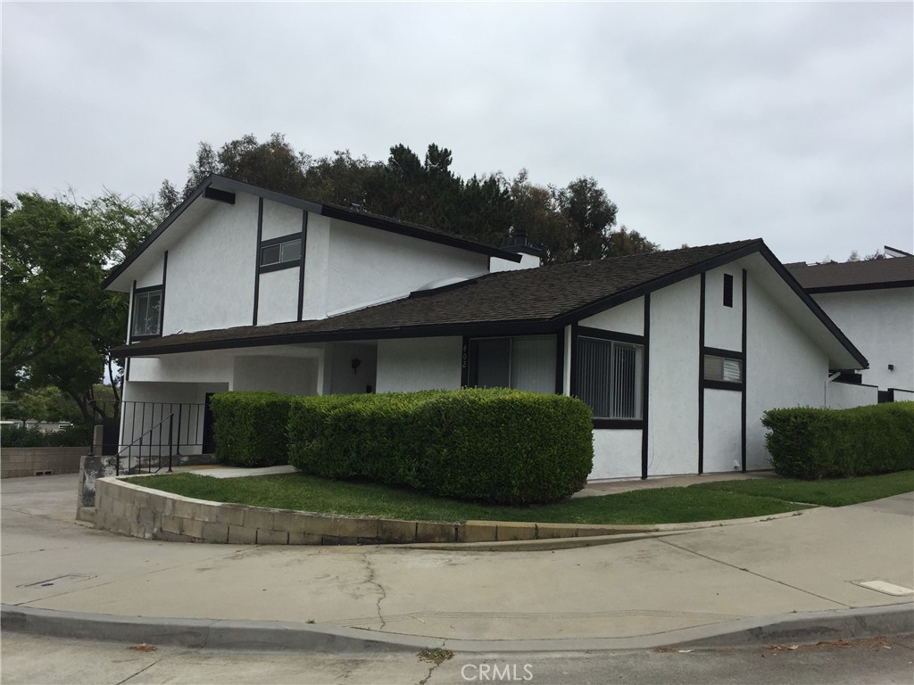 a front view of a house with garage