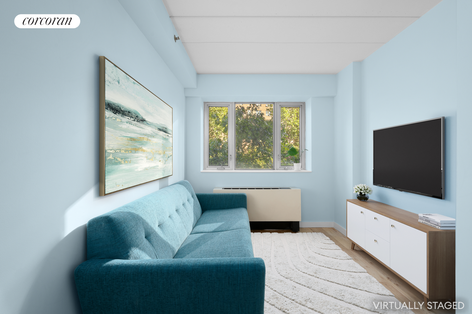 a living room with furniture and a flat screen tv