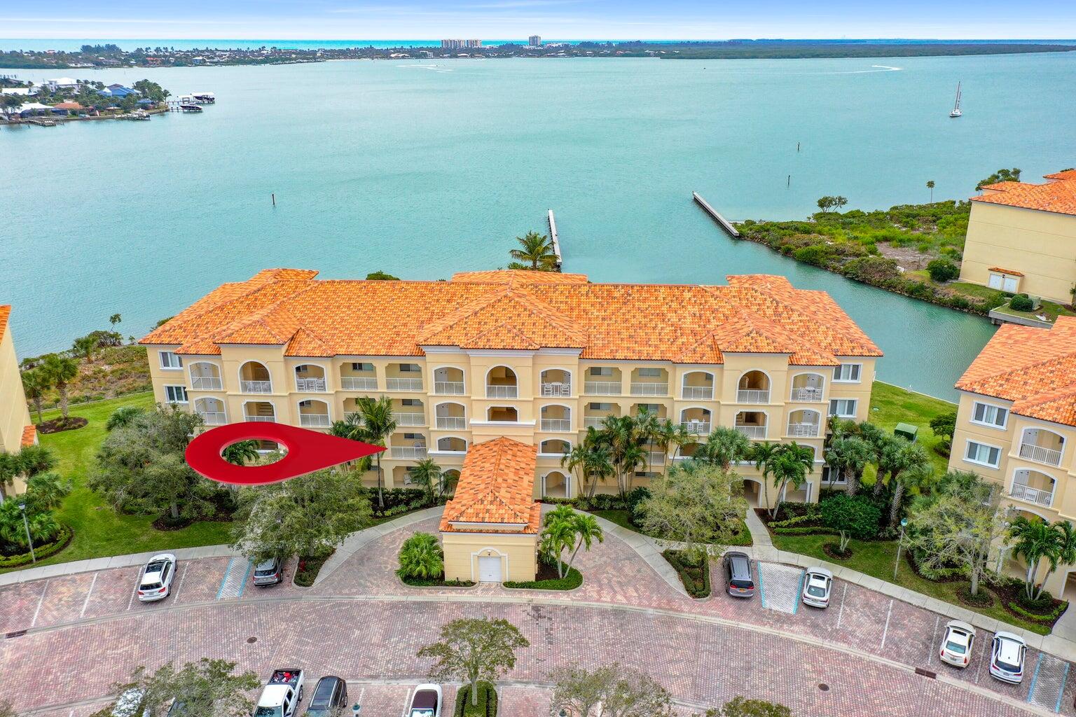 an aerial view of a house with outdoor space lake view and lake view