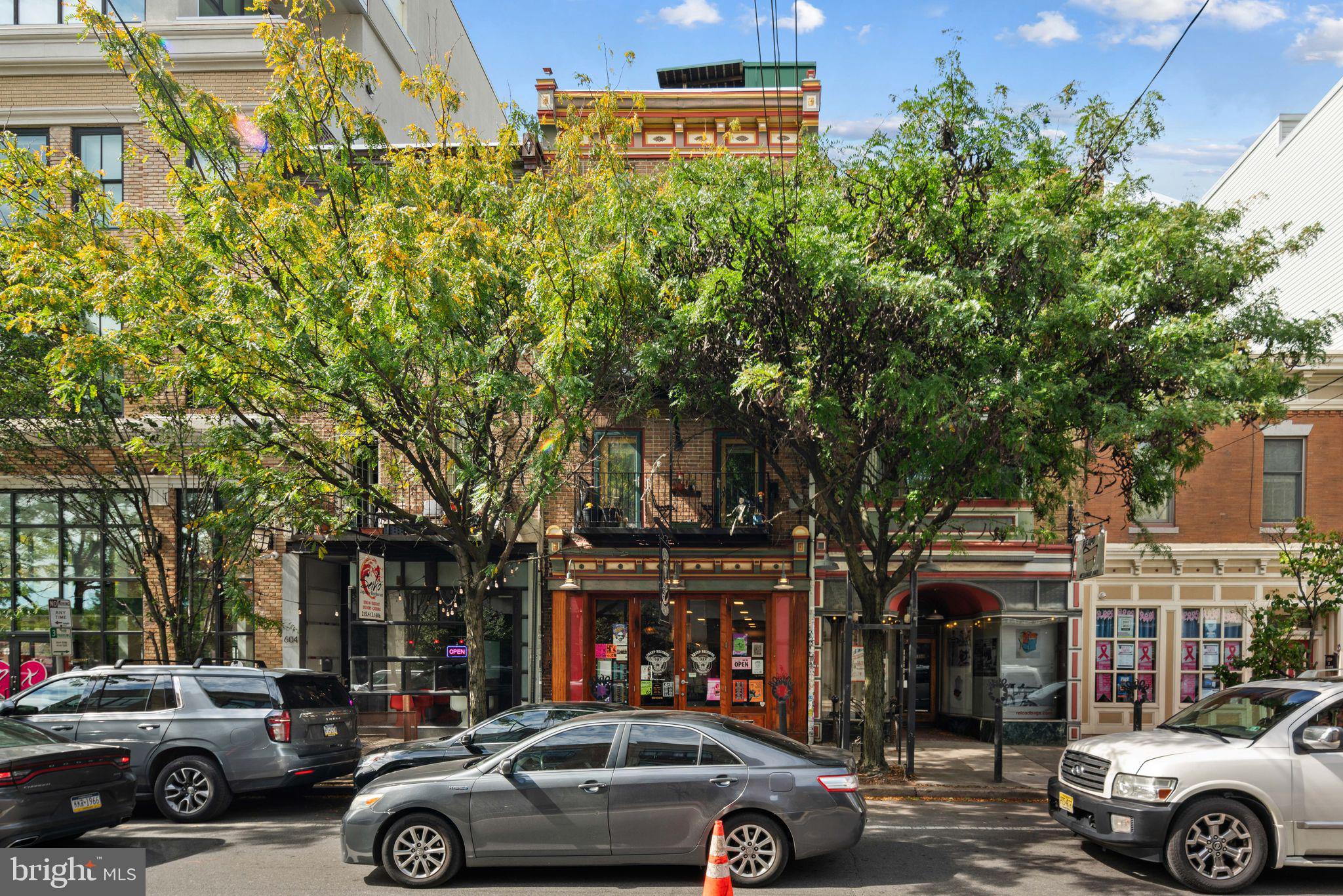 a view of a cars parked in front of a building