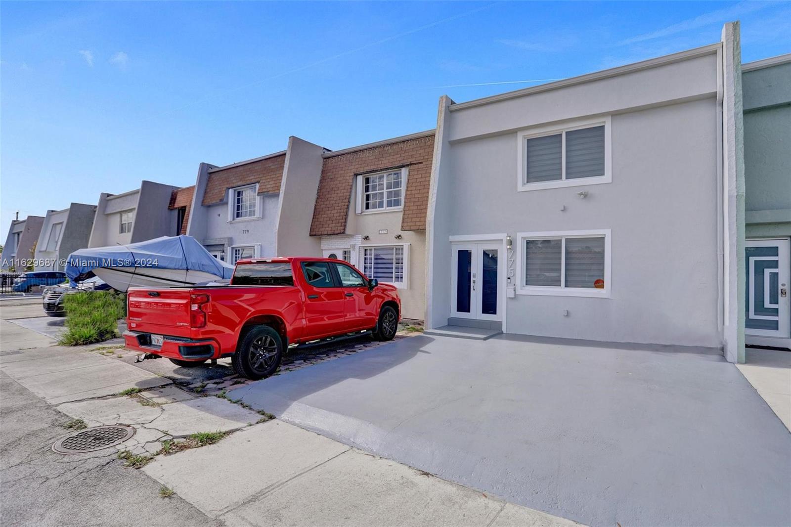 a car parked in front of a house