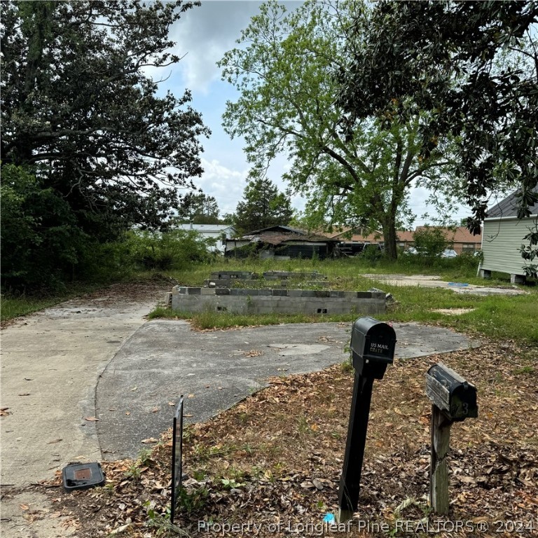 a view of a lake with a yard