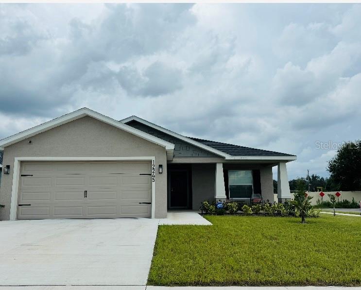 front view of house with a yard