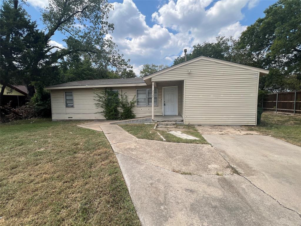 front view of house with a yard