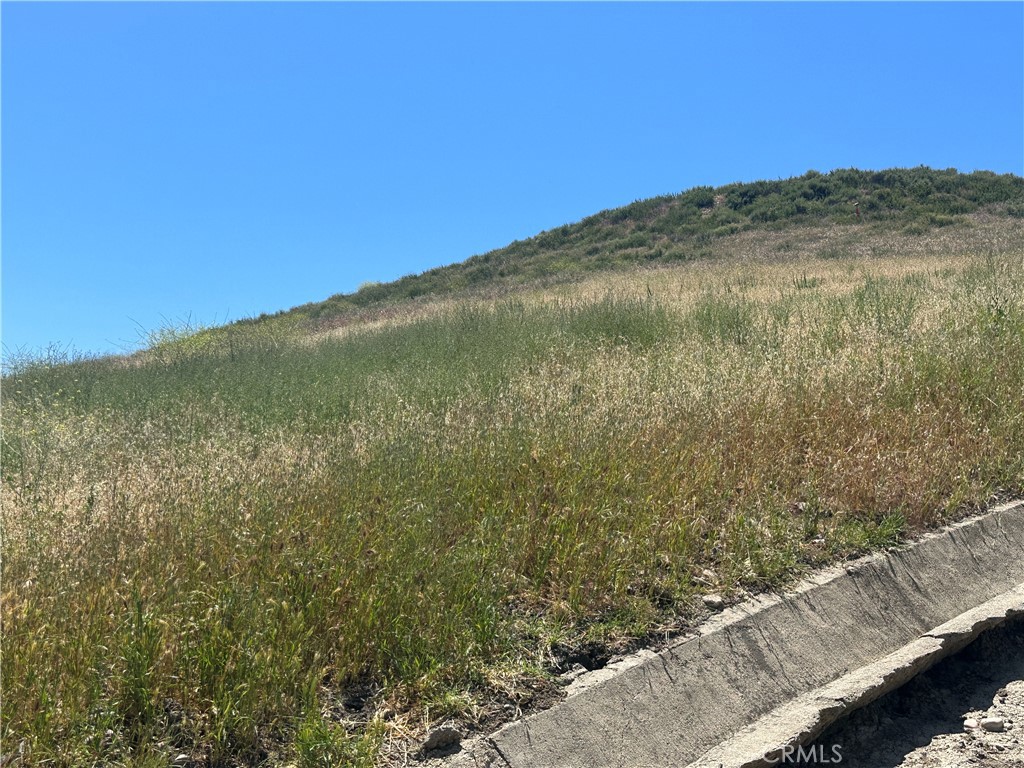 a view of a field with an outdoor space