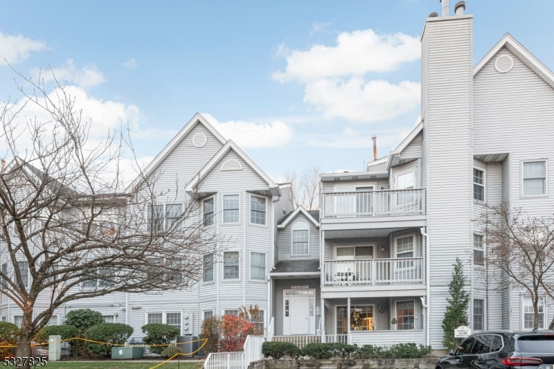 a view of multiple houses with a yard