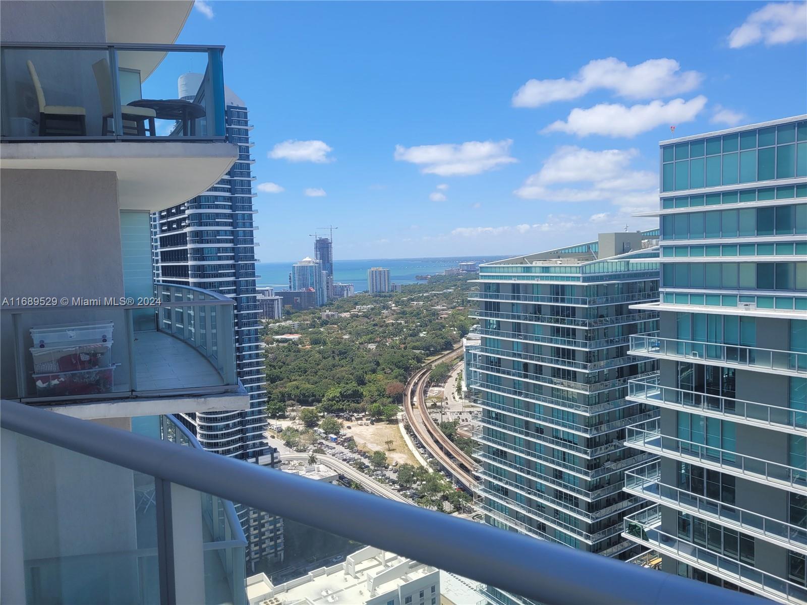 a view of a balcony with city view