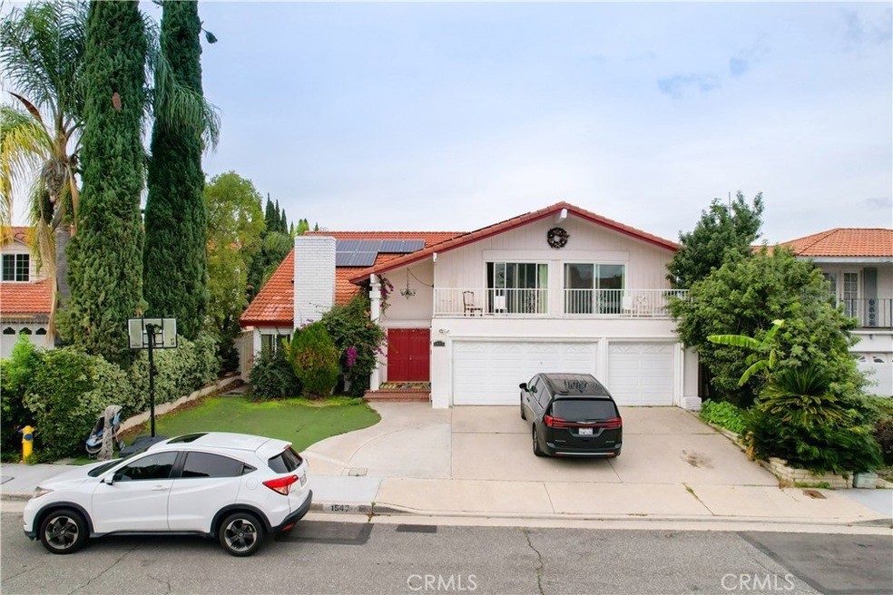 a car parked in front of a house