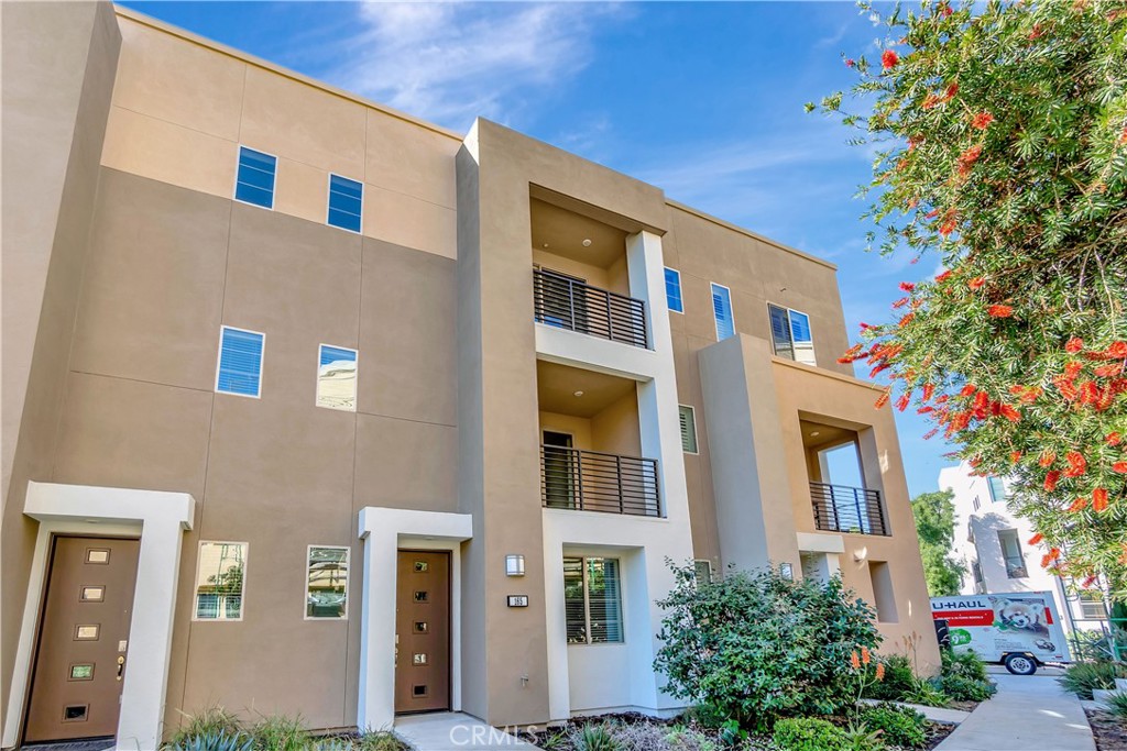 a front view of a multi story residential apartment building