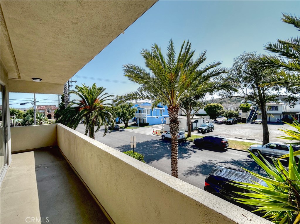 a view of swimming pool with outdoor seating