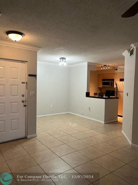 a view of a kitchen with a sink