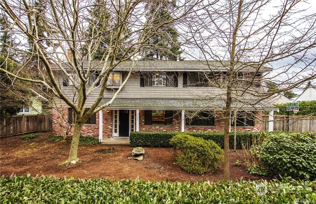 front view of a house with a garden