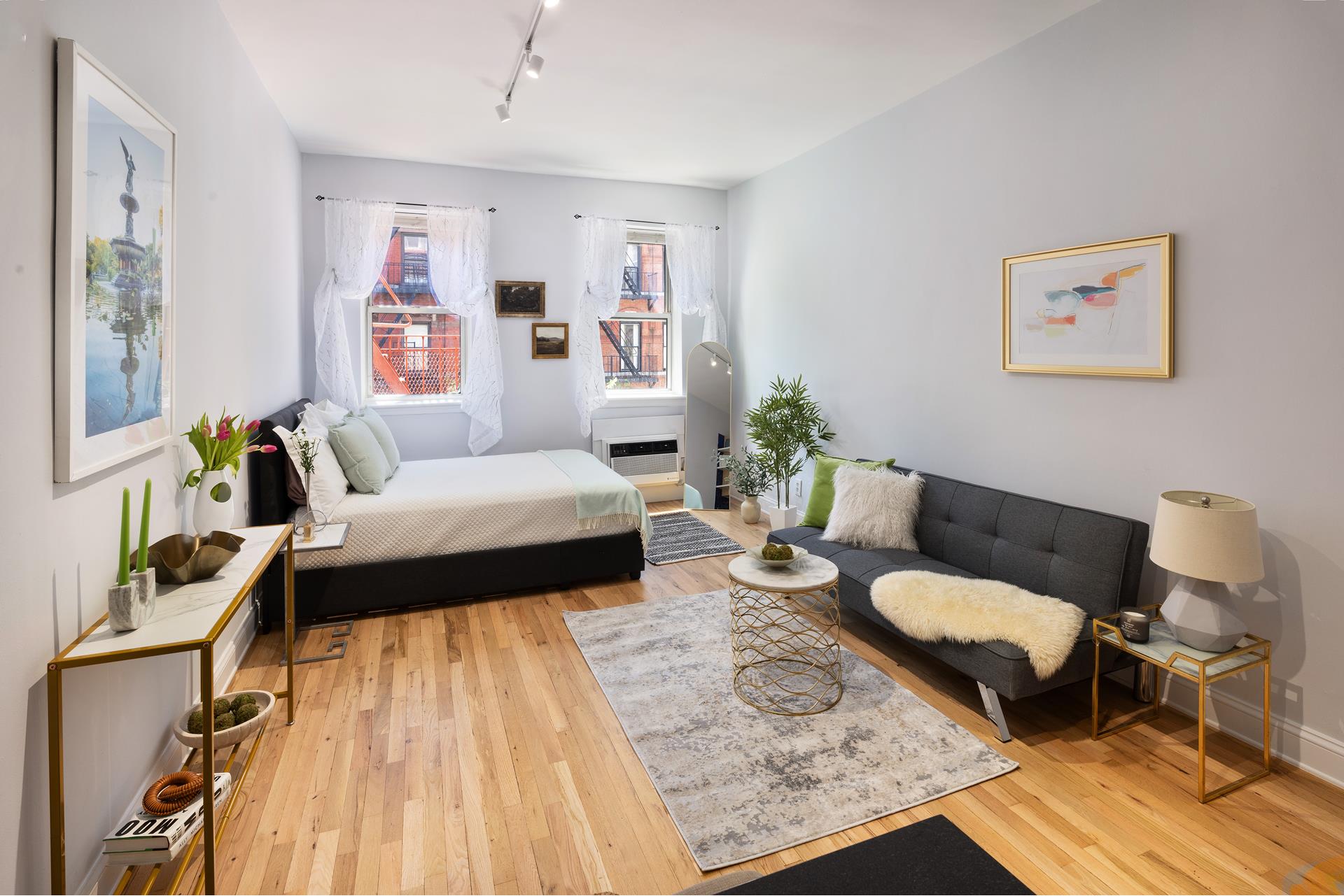 a living room with furniture and a rug