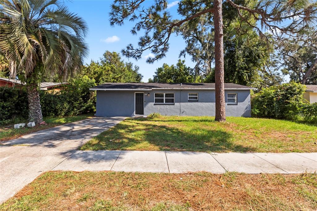 front view of a house with a yard