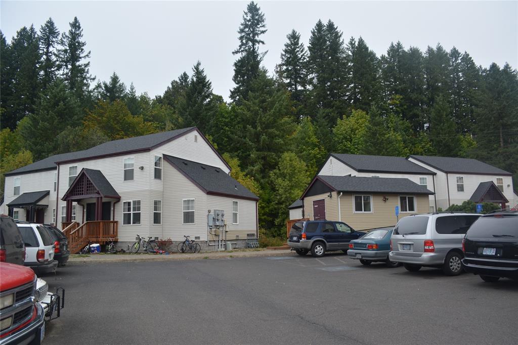 a view of a car park in front of house