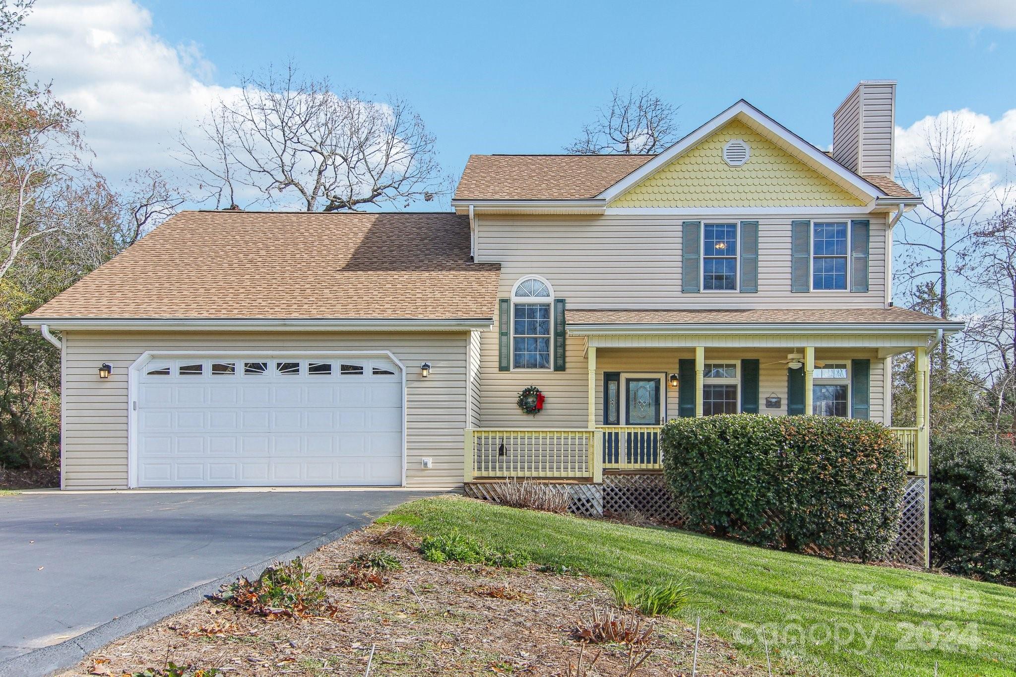 front view of a house with a yard