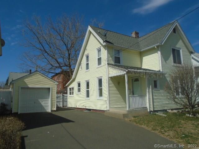 a front view of a house with a garage