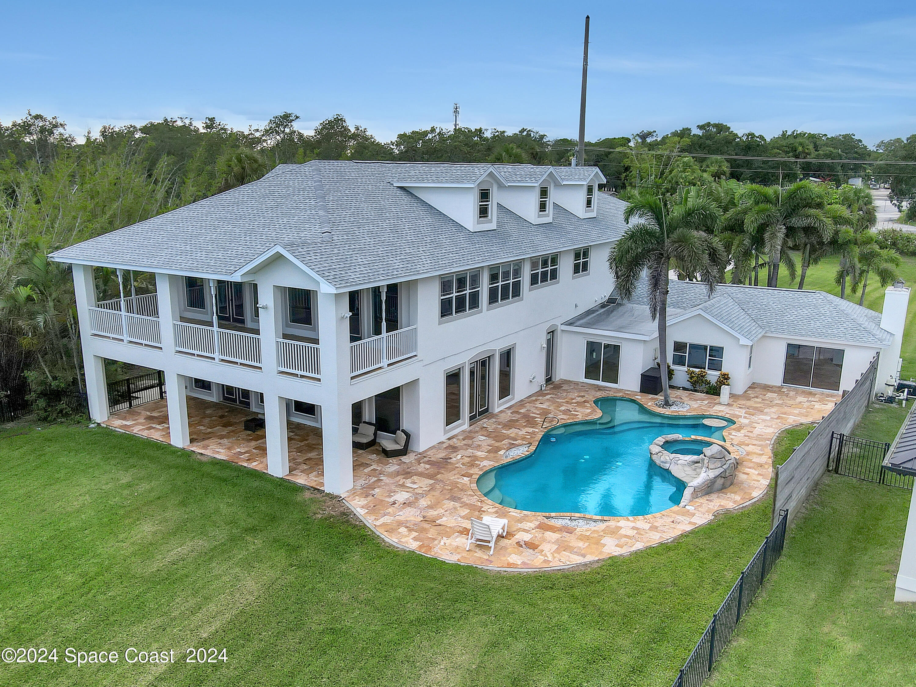 a view of a house with a swimming pool