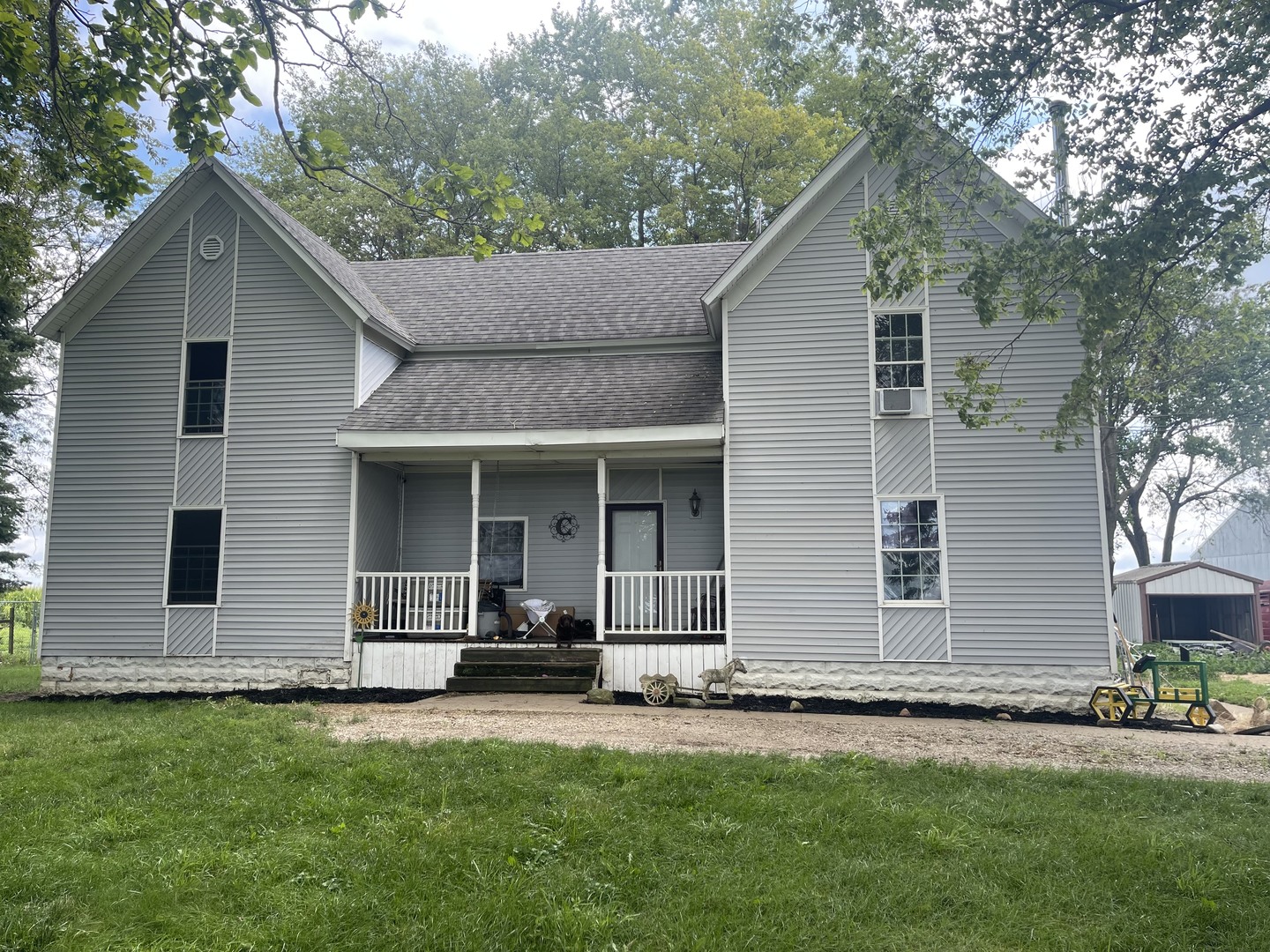 front view of a house with a yard