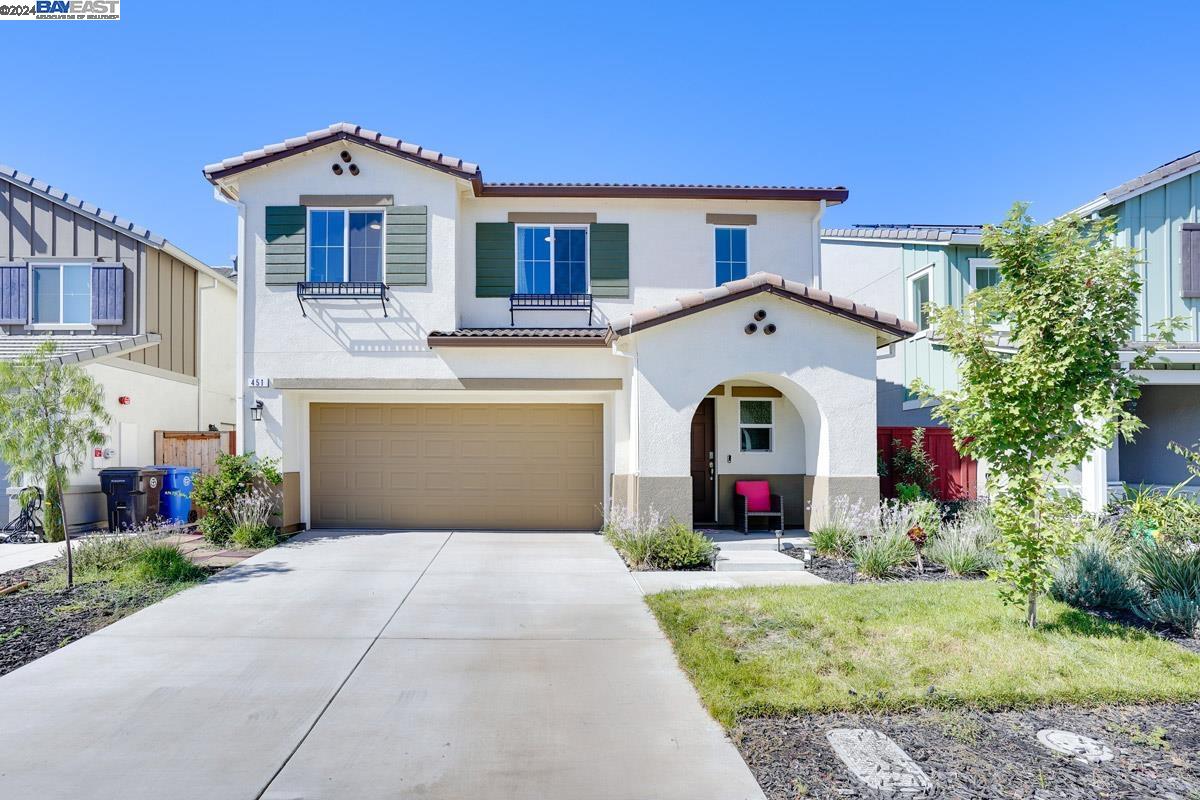 a front view of a house with yard