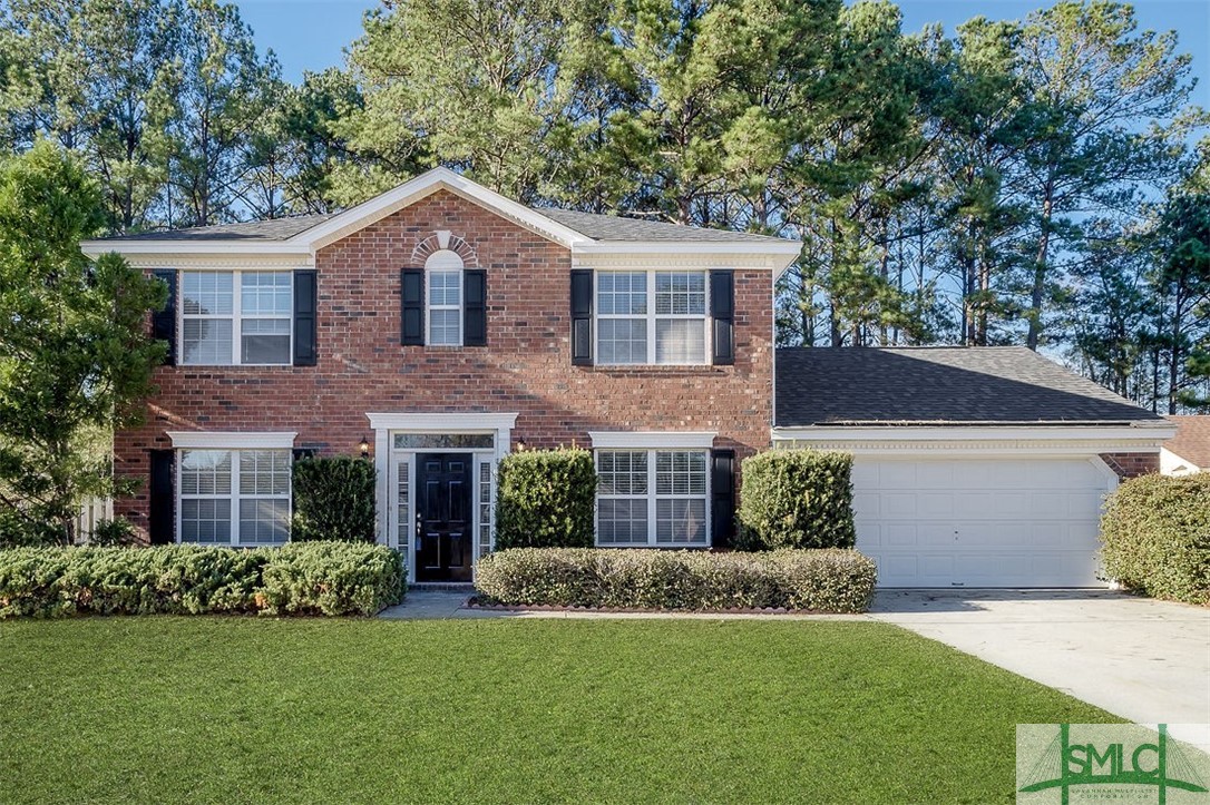 Stately Traditional Home with Brick Exterior and B