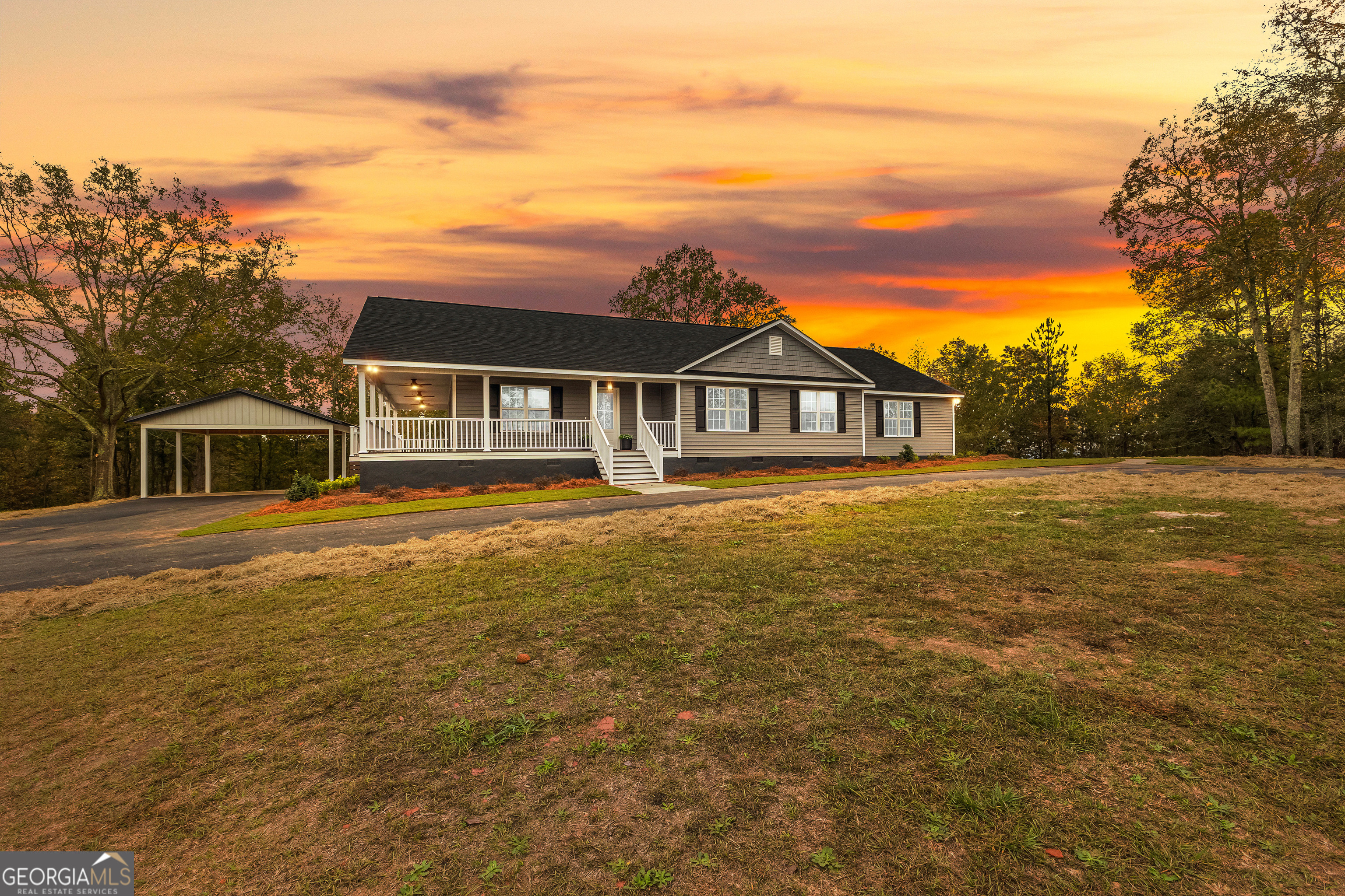 a view of a house with a big yard