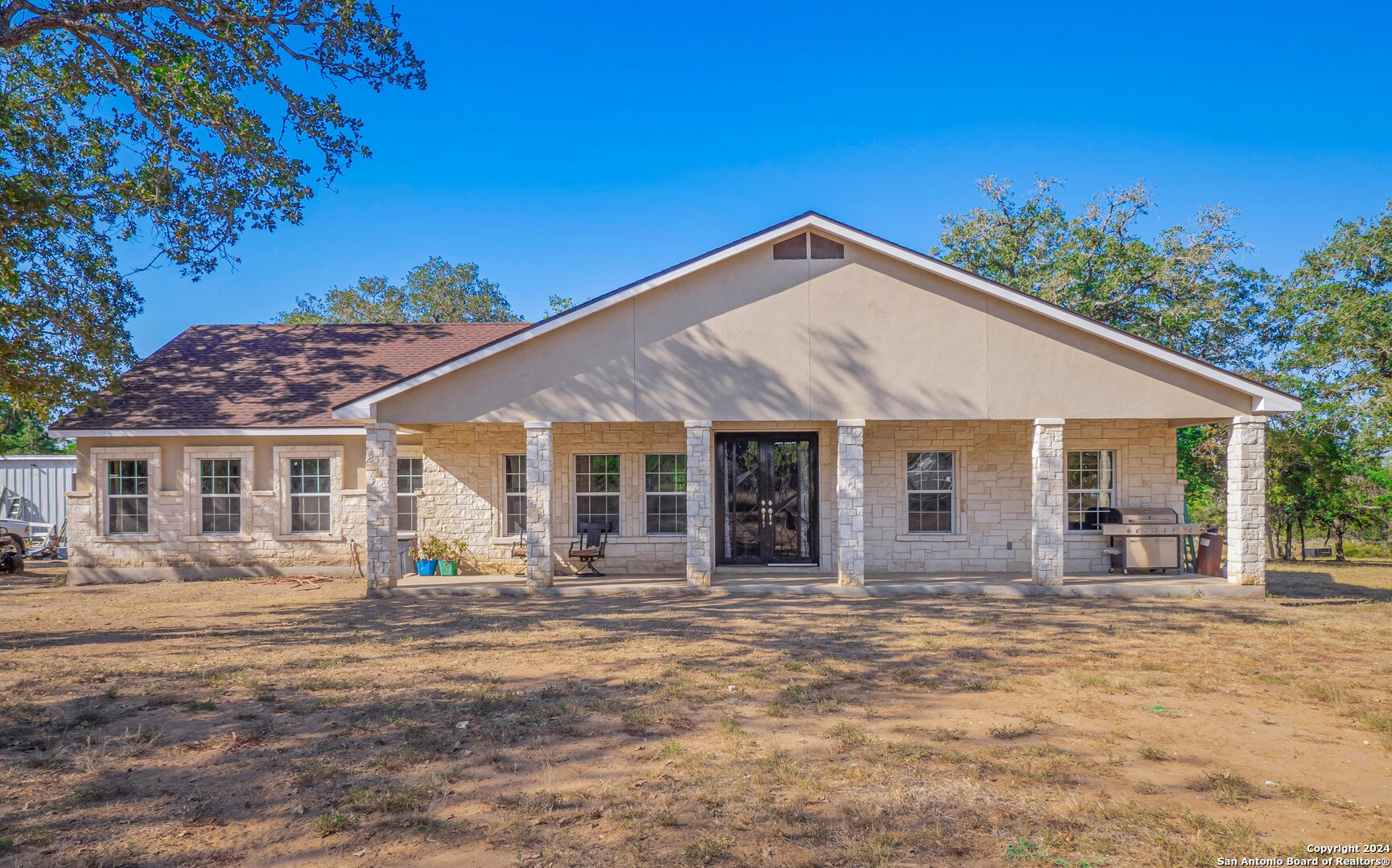 a front view of a house with a porch