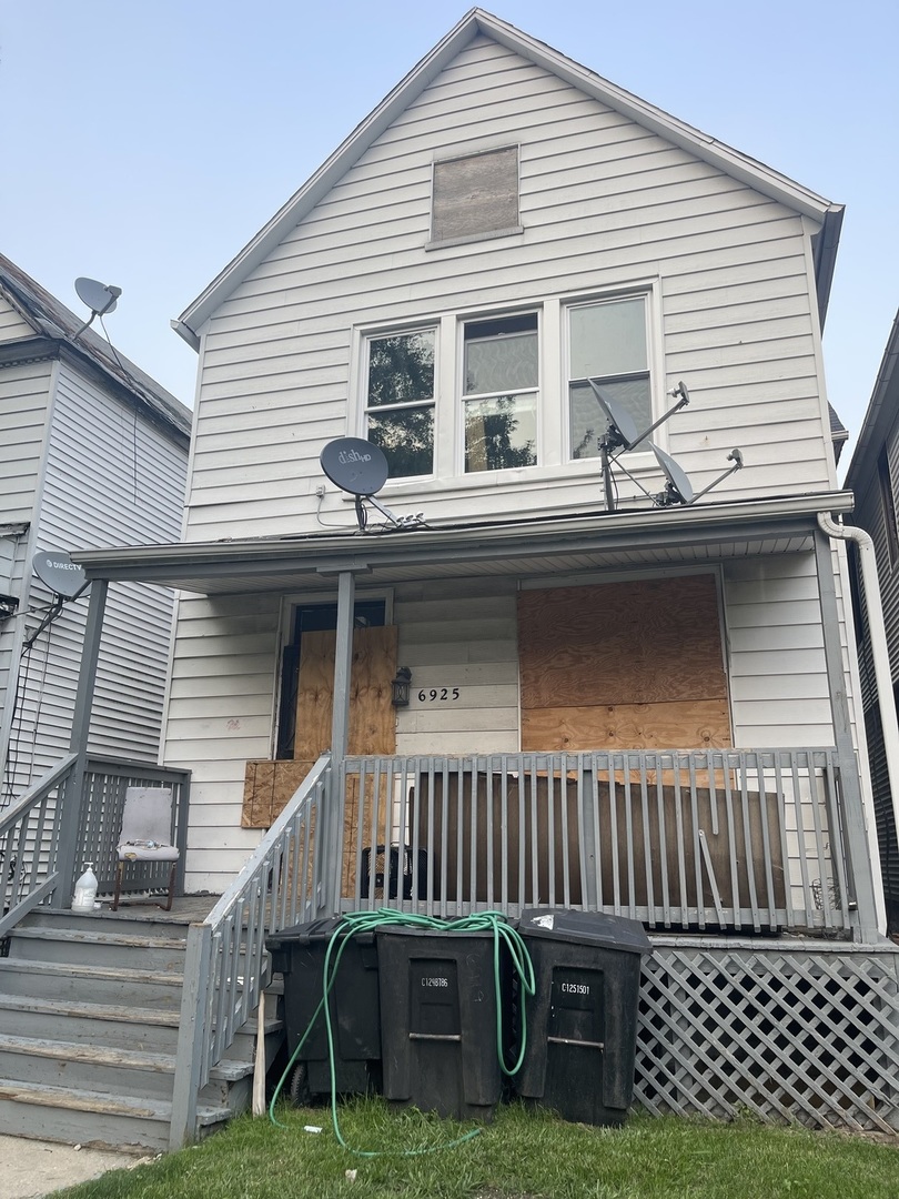 a view of a house with a deck