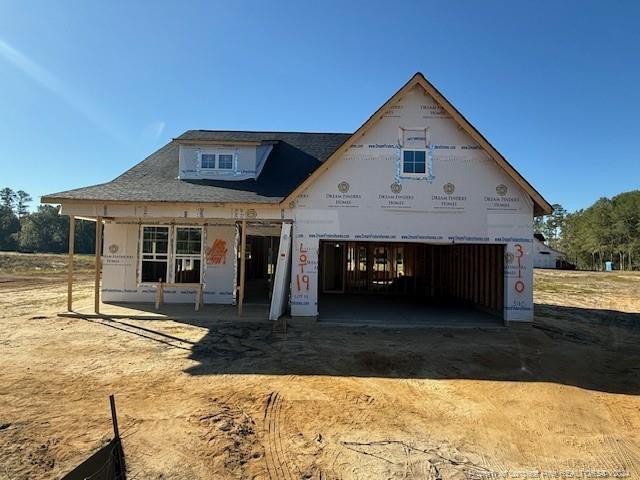 a front view of a house with yard