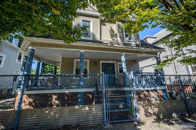 a view of house with a window and wooden floor