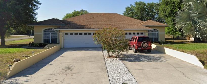 Ranch-style house with a garage