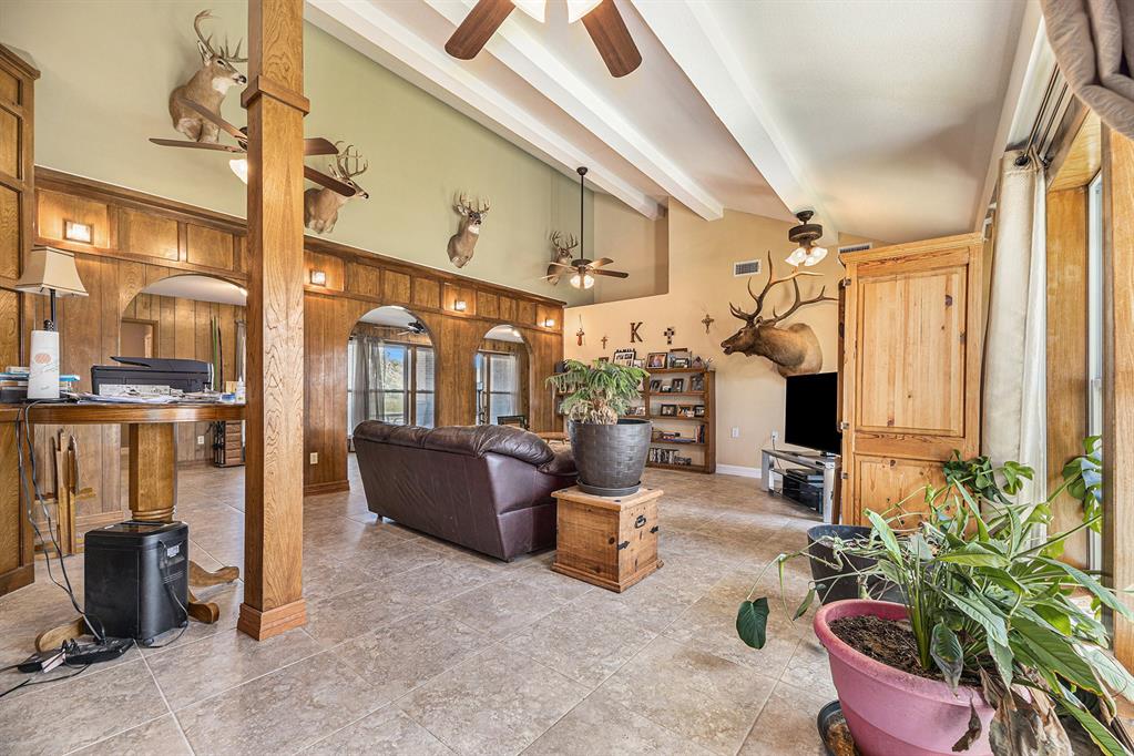 a living room filled with furniture