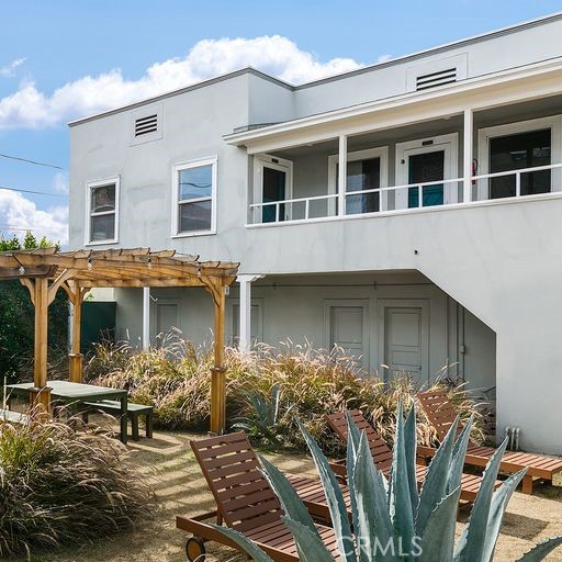 a front view of a house with balcony