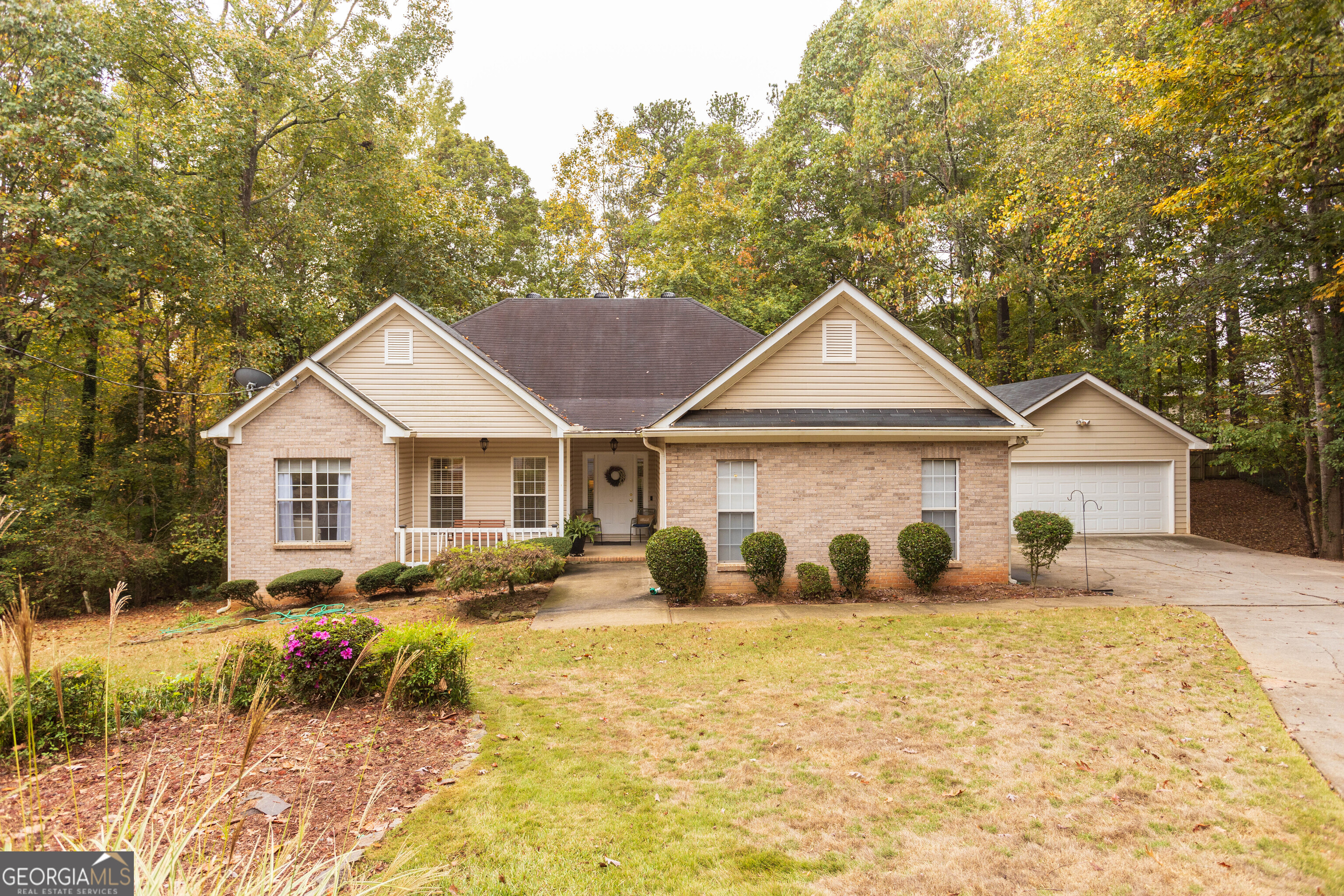 a front view of a house with a yard