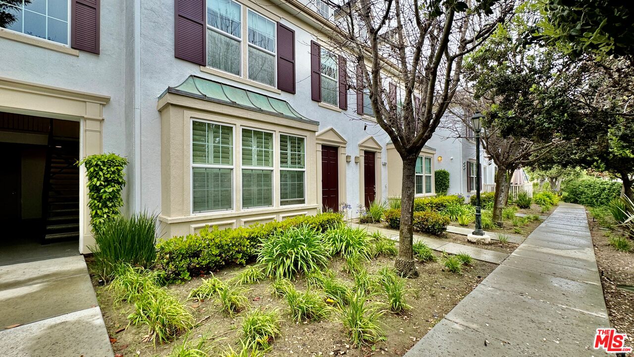 a view of a building with garden