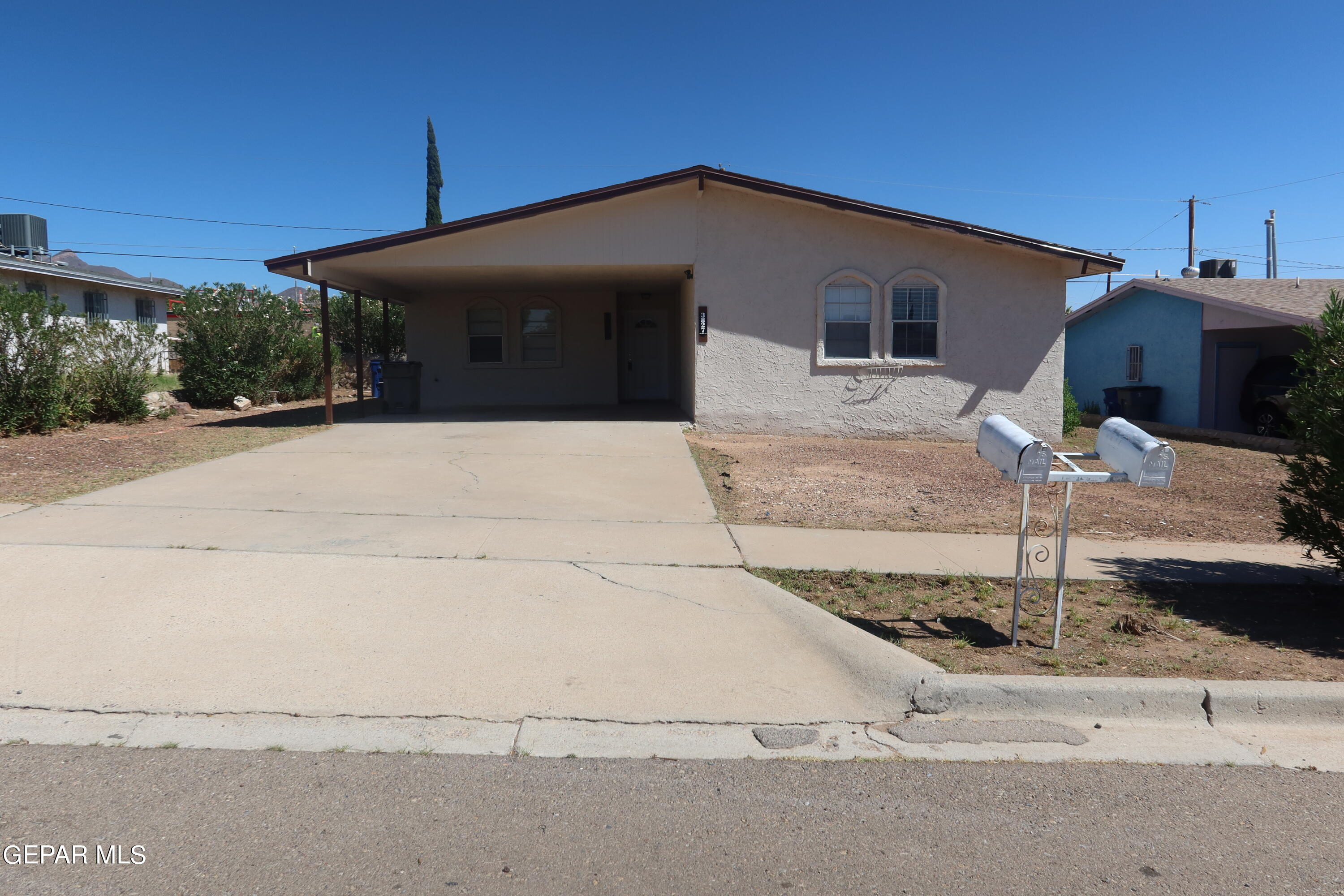 a front view of a house with garage