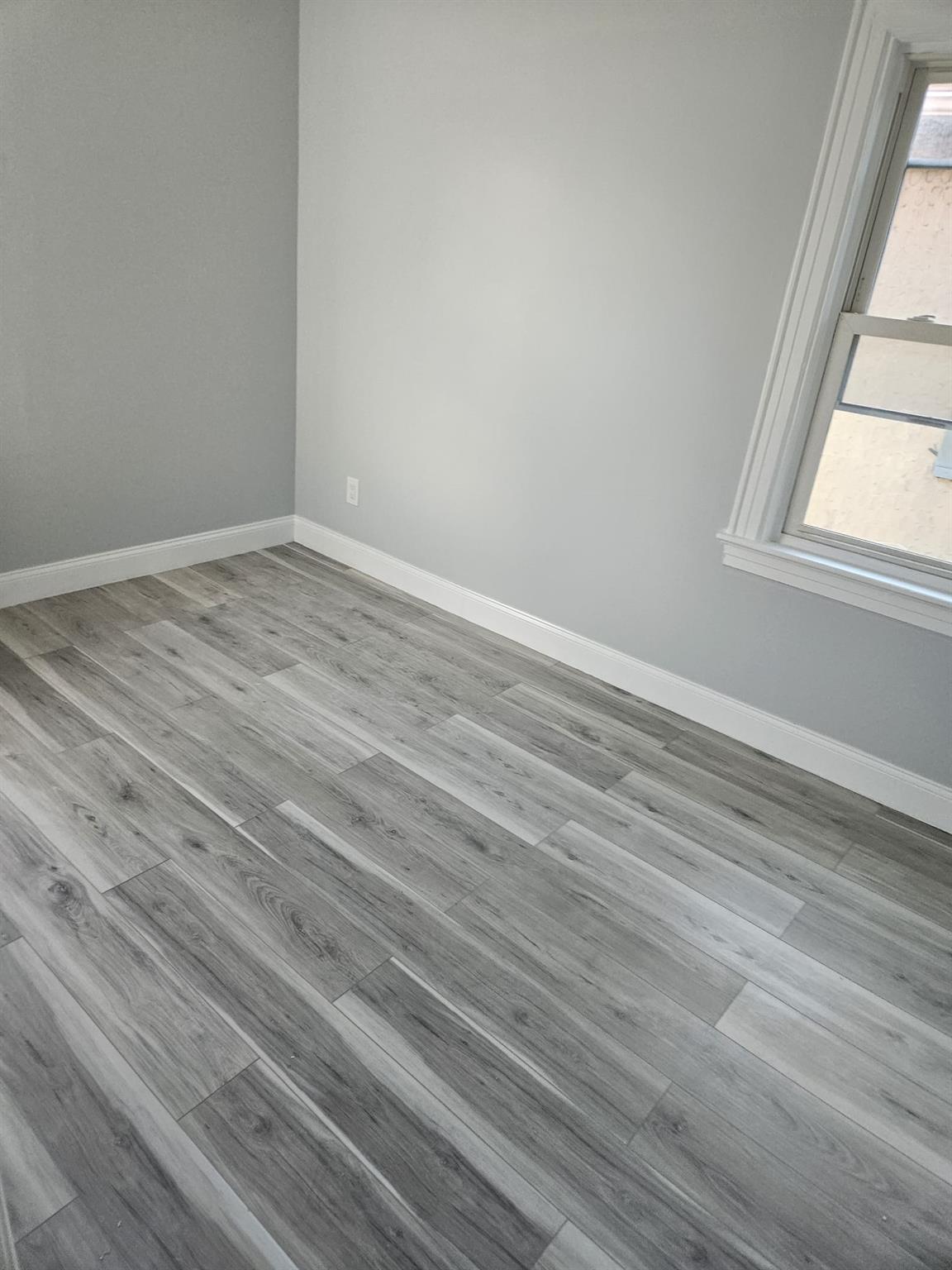 Unfurnished room featuring light hardwood / wood-style flooring